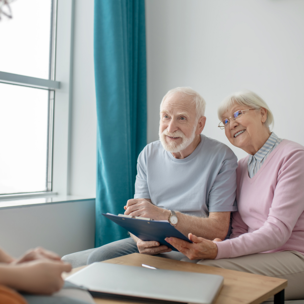 Senior couple reviewing Medicare Advantage plan options.